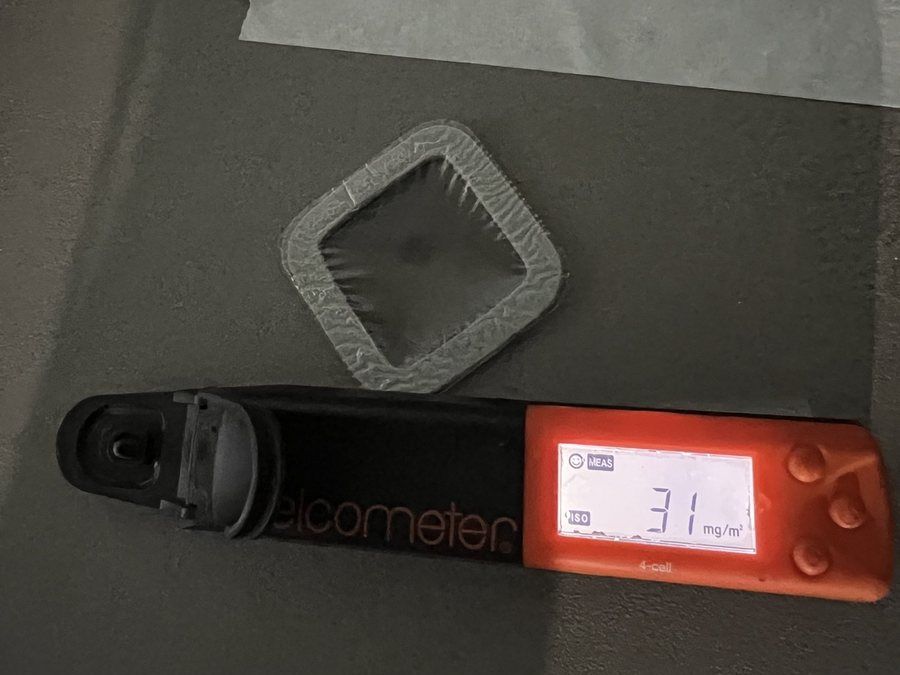 Bresle test with Elcometer salt meter on a blasted tank floor, reading in mg/m²